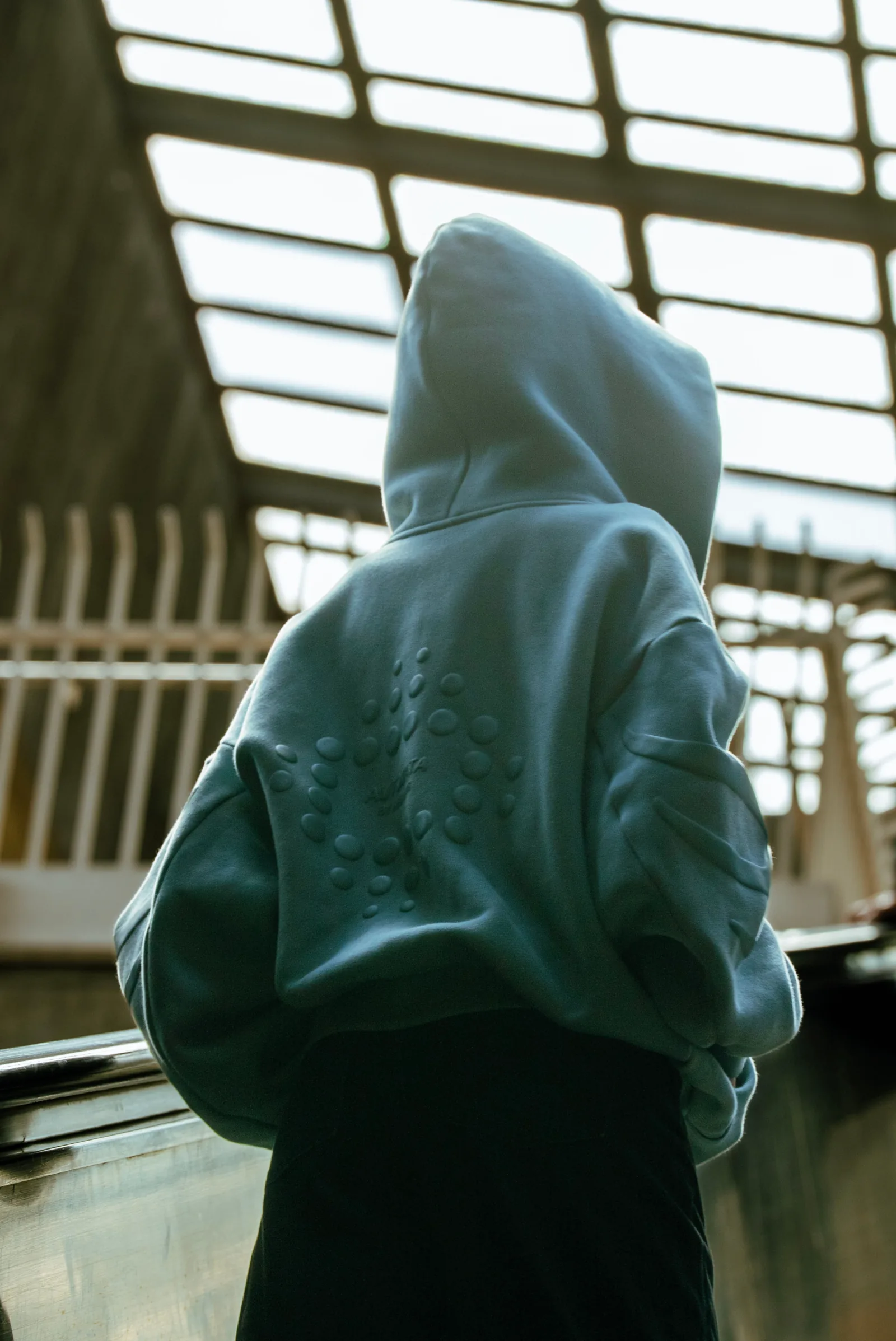 Model wearing the Dedalus cloud zipup